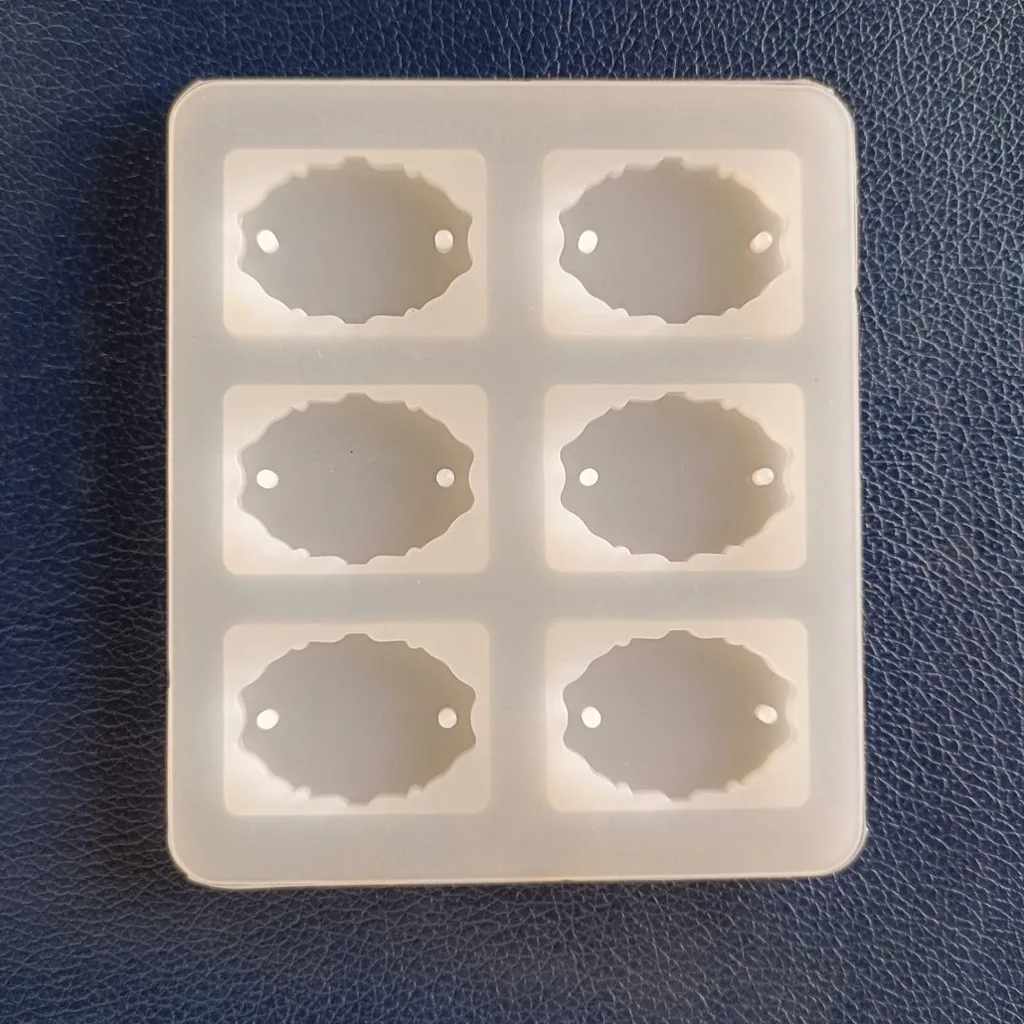 6 Cavity Oval Agate Rakhi Silicone Mould for Resin Art | DIY Rakhi Making Mould with Thread Holes 6 Cavity Oval Agate Rakhi Silicone Mould for Resin Art | DIY Rakhi Making Mould with Thread Holes